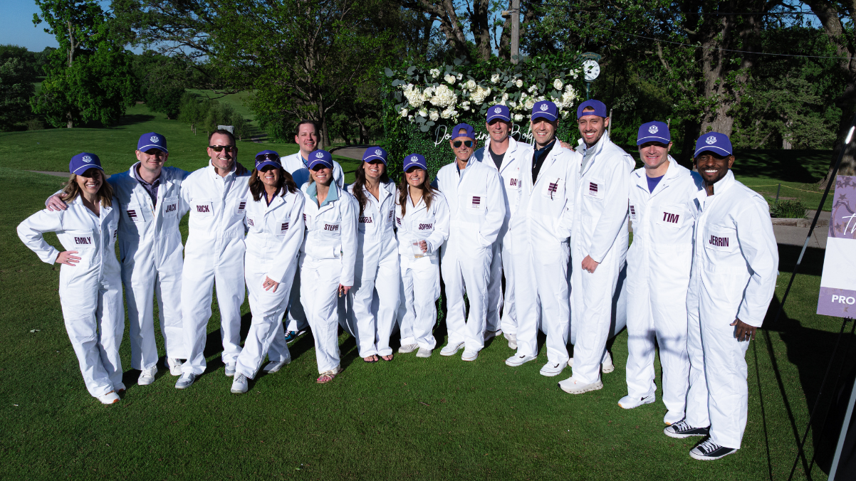 ICS workers in golf caddy uniforms.
