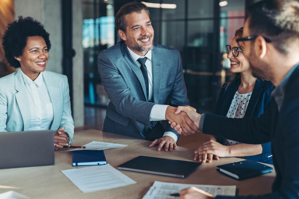 Business success around a conference table.